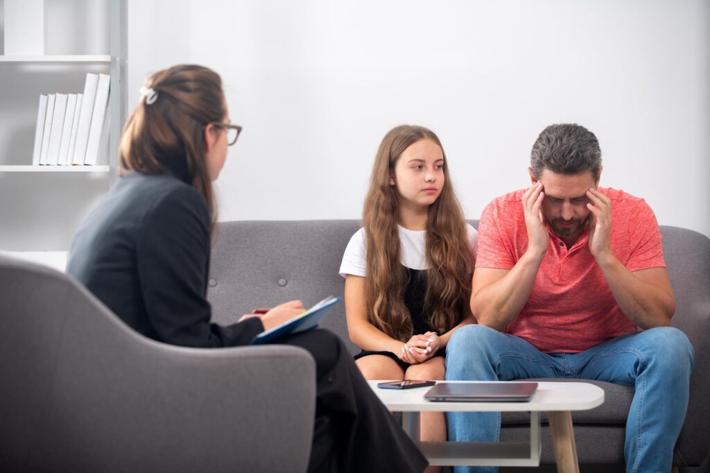 Psychologist give family therapy for dad and daughter teenager girl, psychology.